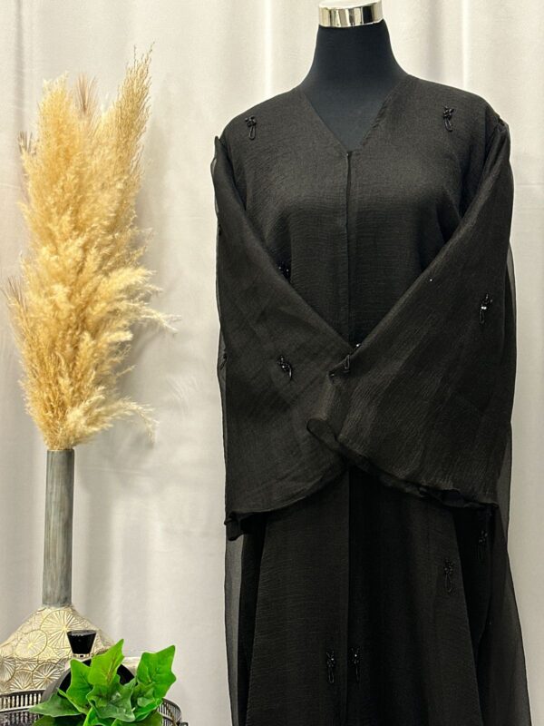 Straight buttoned up abaya with detailed handwork on sleeves and down the sides - Image 2