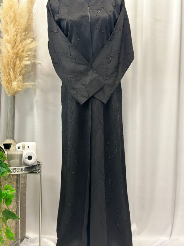 Straight buttoned up abaya, fully embroided with stones