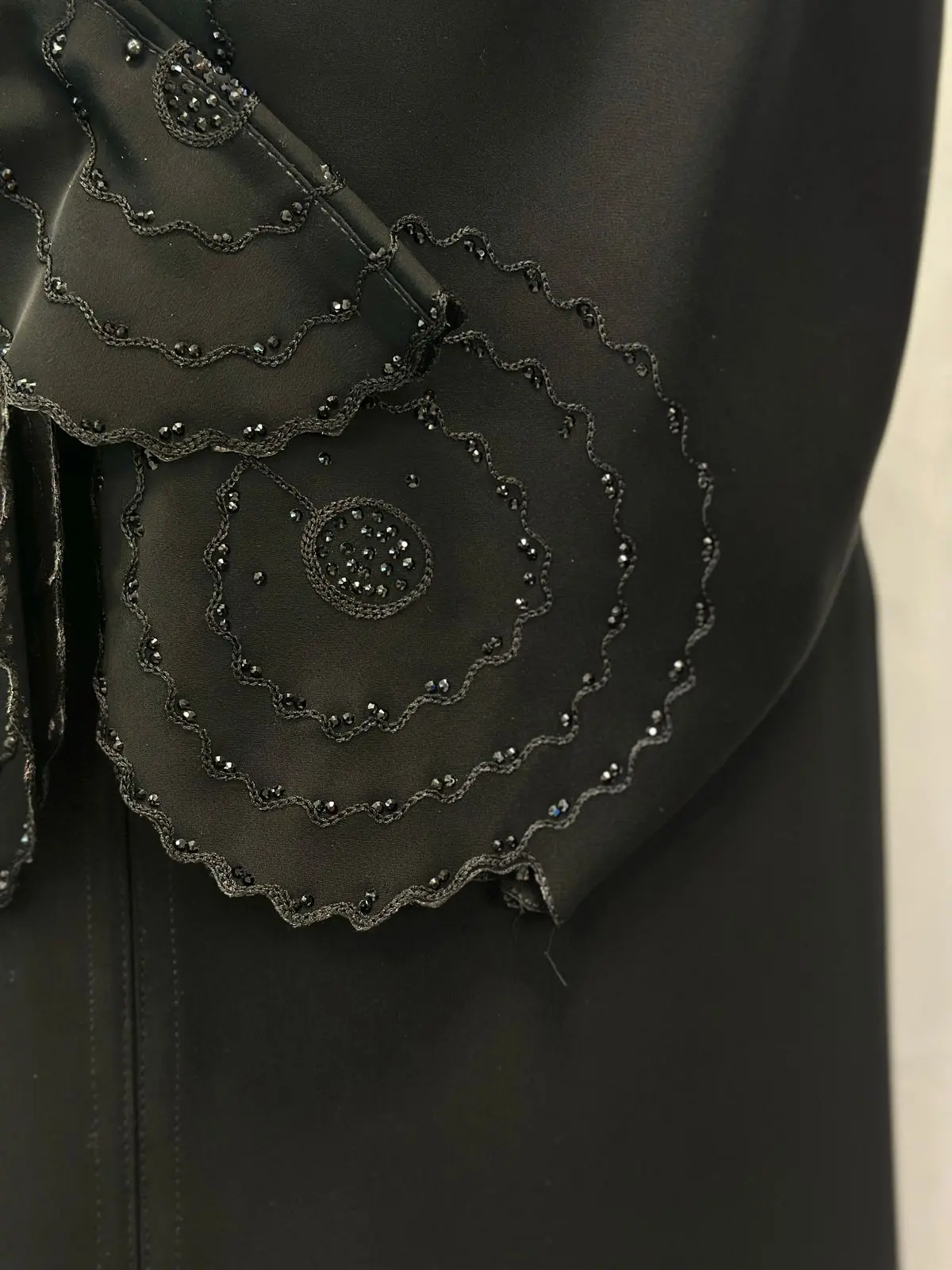 Straight buttoned up abaya embroidery with stoneson the sleeve and bottom - Image 3