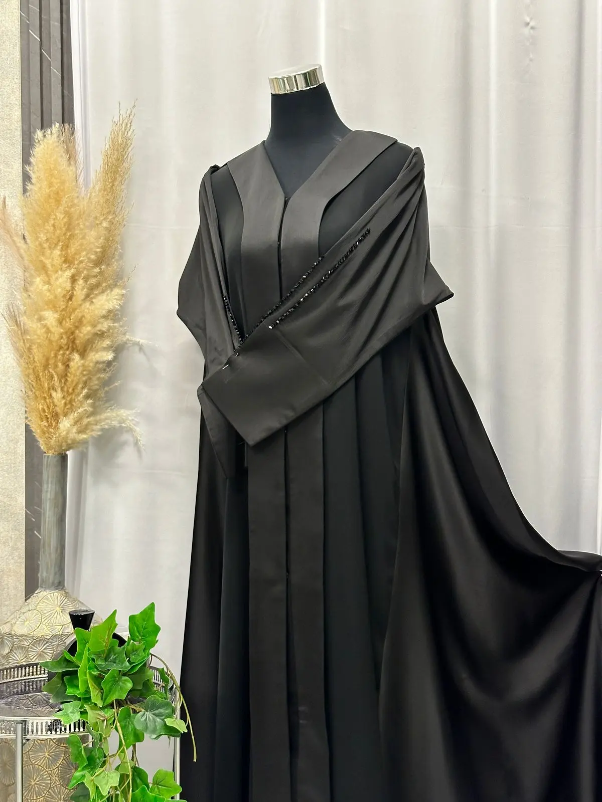 Umbrella styled buttoned up abaya with handworked stones on the sleeve - Image 2