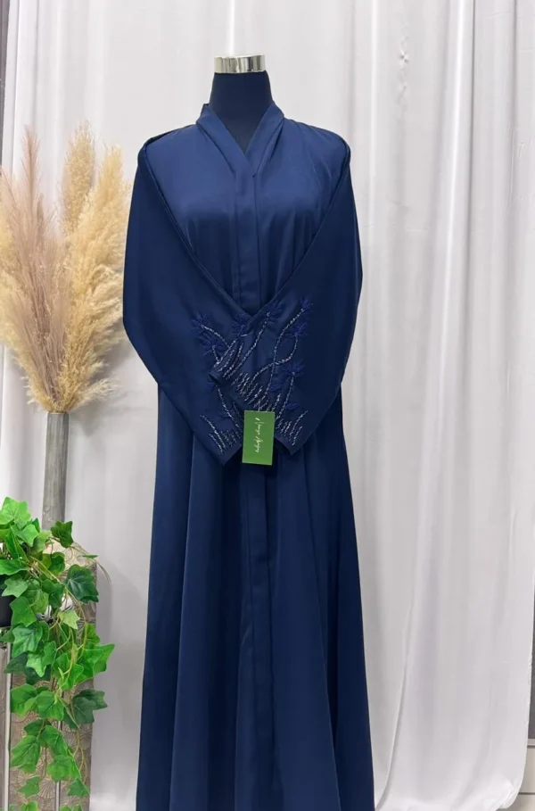 Umbrella styled buttoned up abaya with handworked on the sleeve