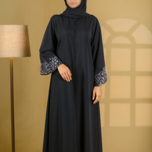 Buttoned up, laser work on the sleeves with embedded stones