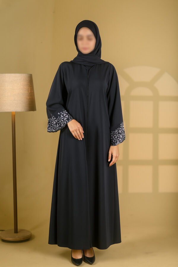 Buttoned up, laser work on the sleeves with embedded stones