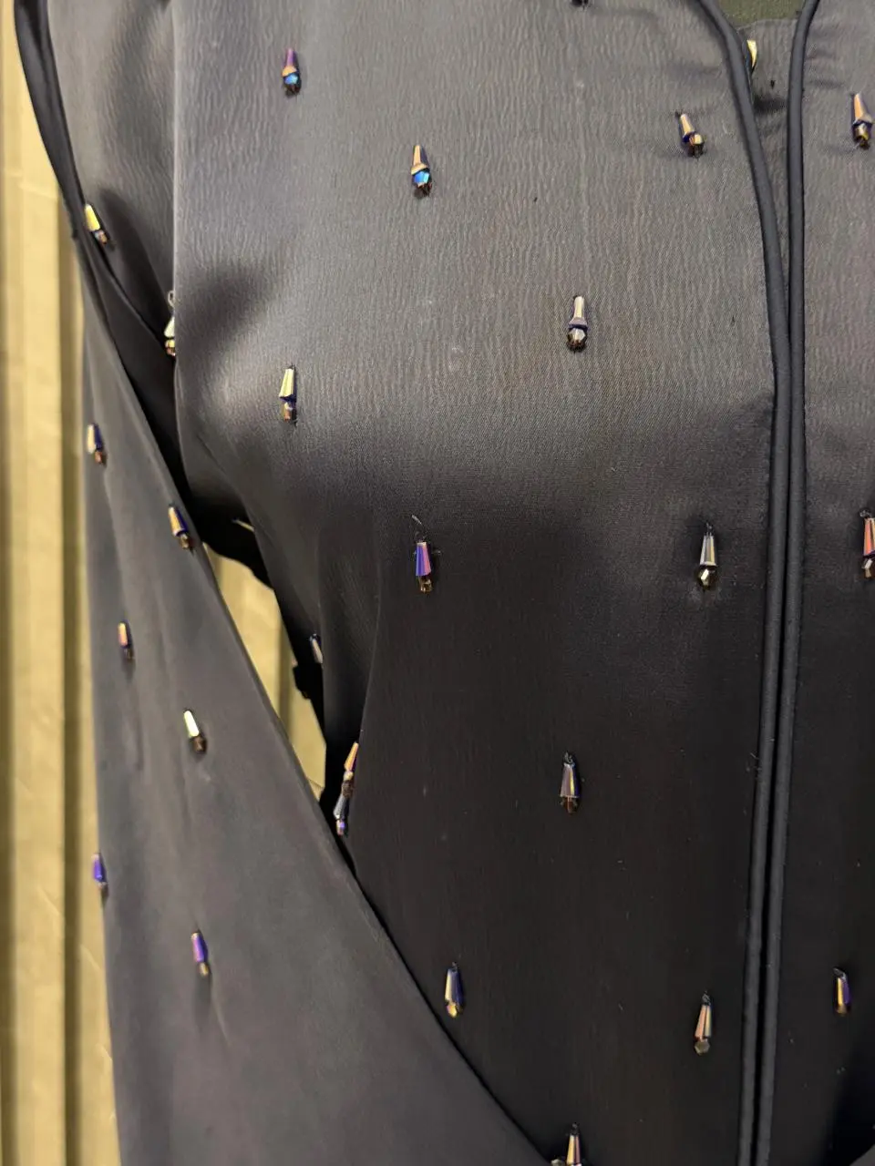 Buttoned up, tubes beaded work on the upper body - Image 2