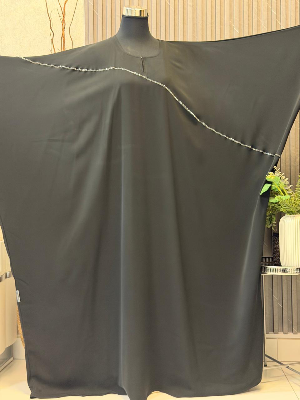 Plain Farasha with a two lined 100% guaranteed premium stonework all around the abaya and the scarf