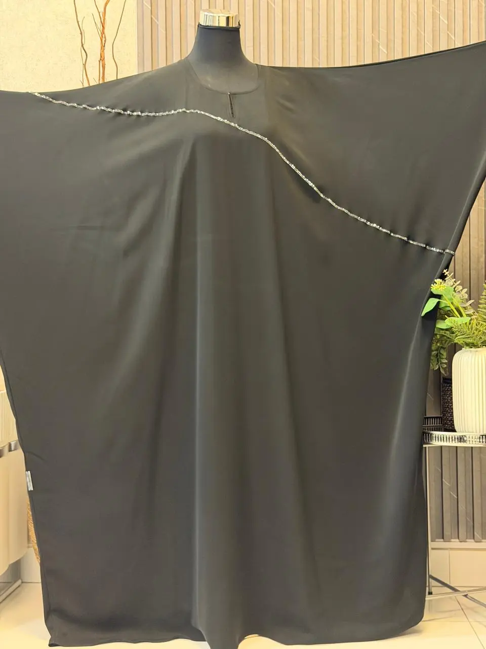 Plain Farasha with a two lined 100% guaranteed premium stonework all around the abaya and the scarf