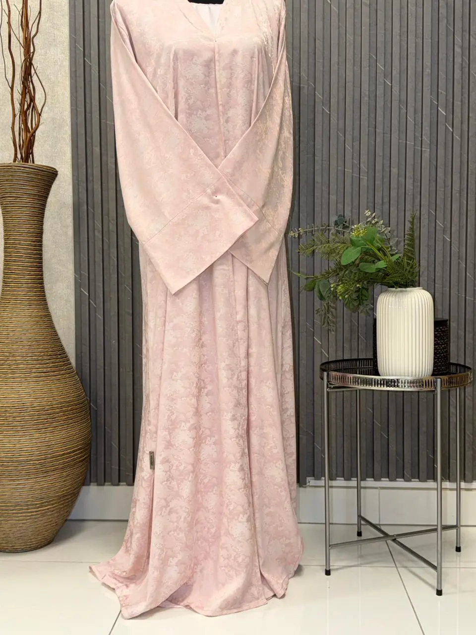 Open Abaya on a self textured cloth with a slit on the sleeve