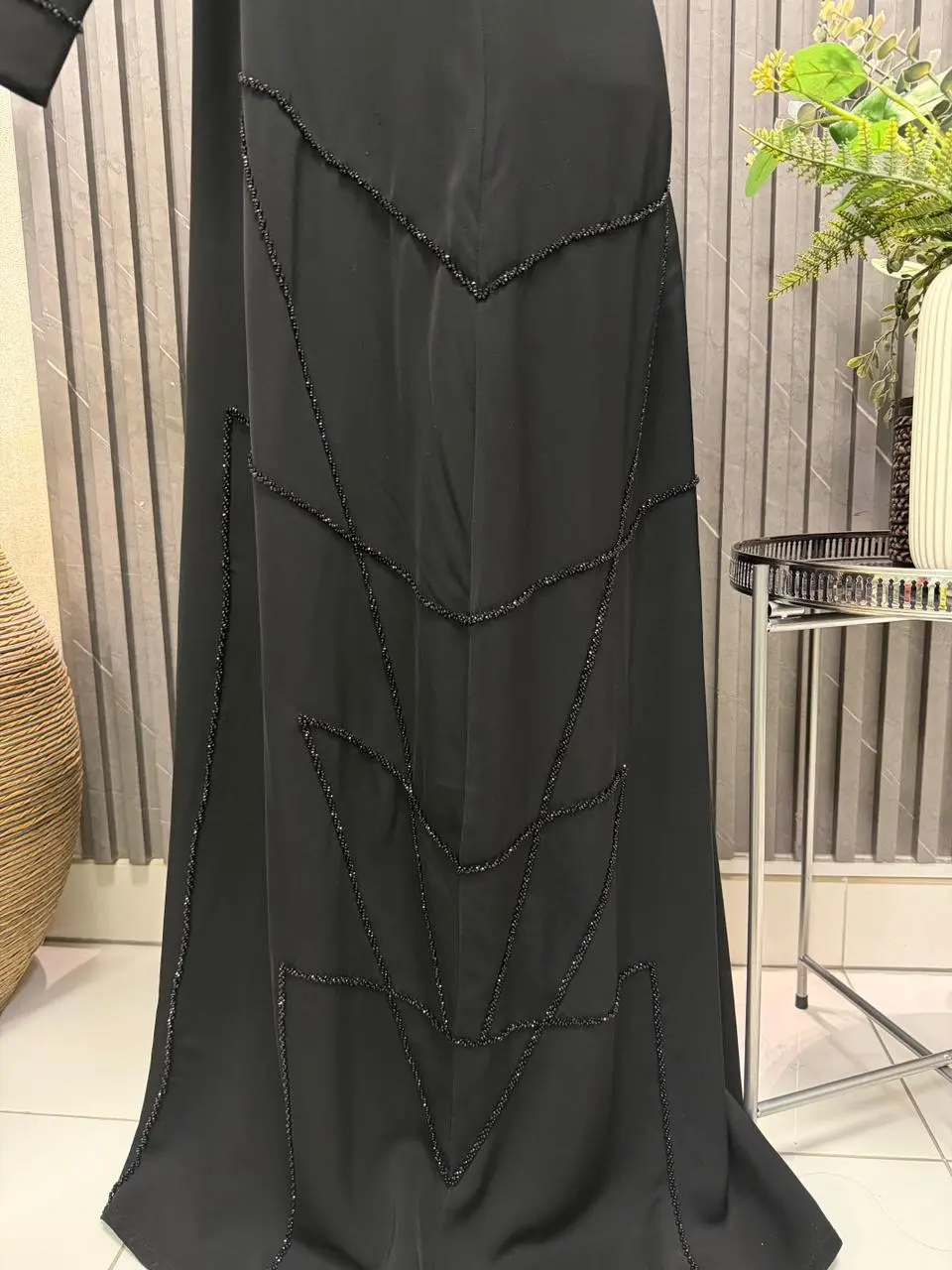 A- lined Abaya with beaded work on the sleeves and slide - Image 2