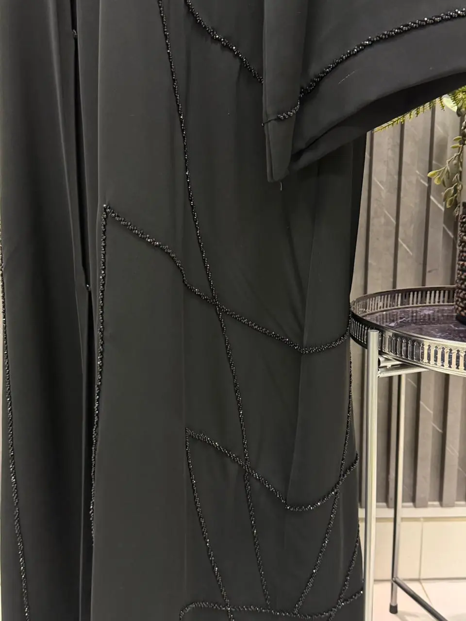 A- lined Abaya with beaded work on the sleeves and slide - Image 3