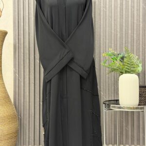 A- lined Abaya with beaded work on the sleeves and slide