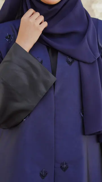 Blue buttoned-up two-toned straight abaya with embedded beads on the front
