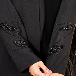 Buttoned-up straight abaya featuring embedded beads on the sleeves and pockets