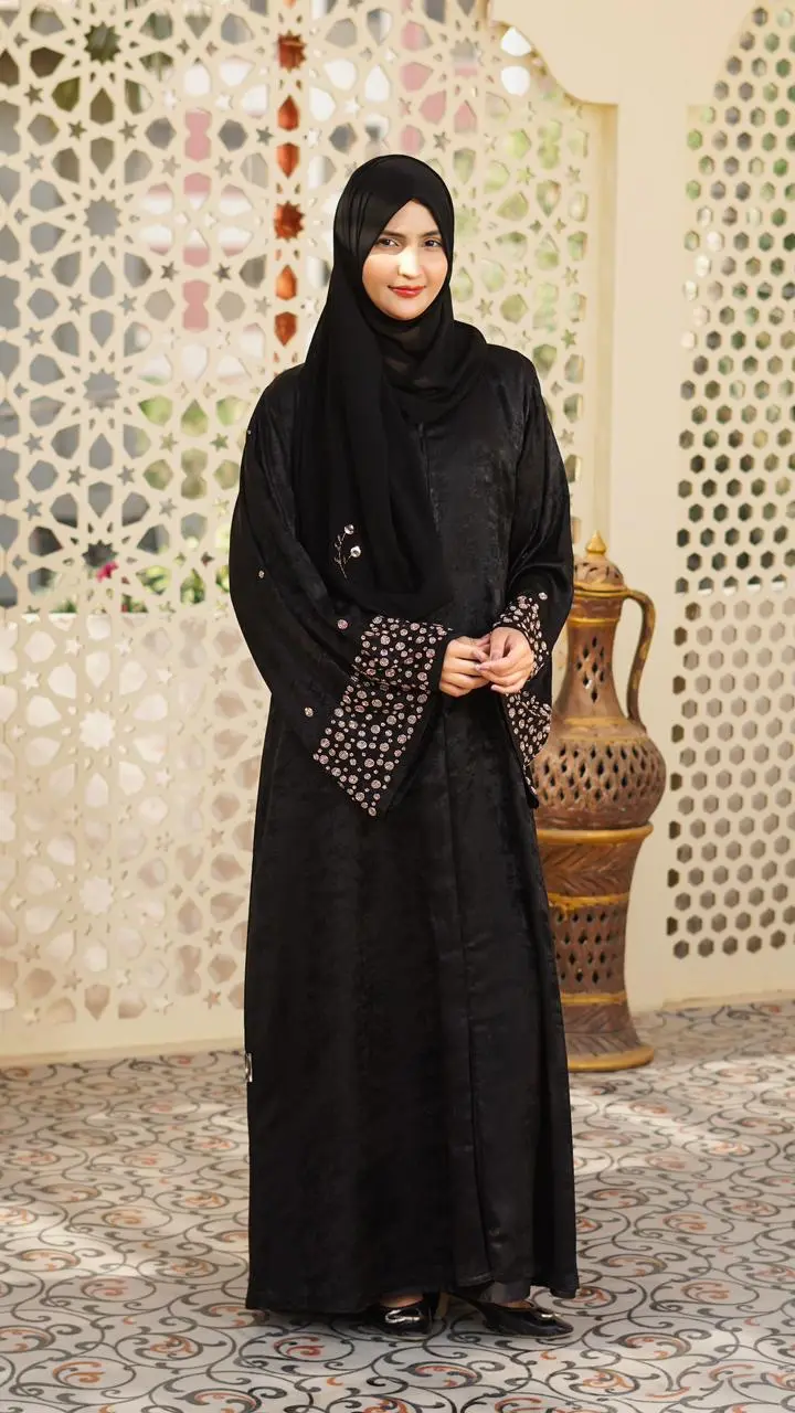 A refined abaya in premium Roso fabric, highlighted with elegant rose-gold work on the sleeves and duppata for a subtle, luxurious finish. - Image 3