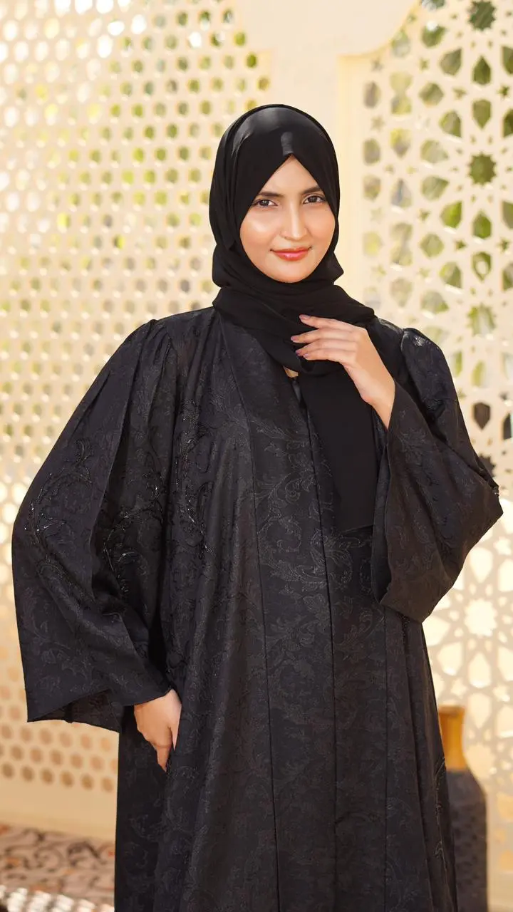 Straight-cut abaya crafted in self-designed fabric, enhanced with fine cut bead embellishment - Image 2